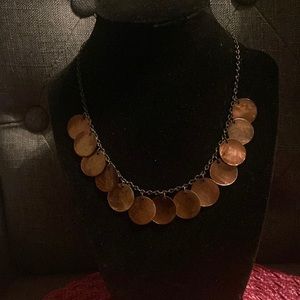 Antiqued bronze with brown shell discs